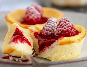 Lemon Raspberry Cheesecakes.