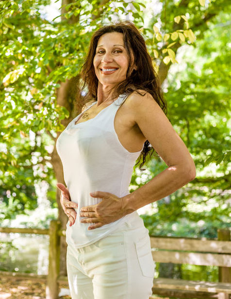 Lady Happy Holding Belly.